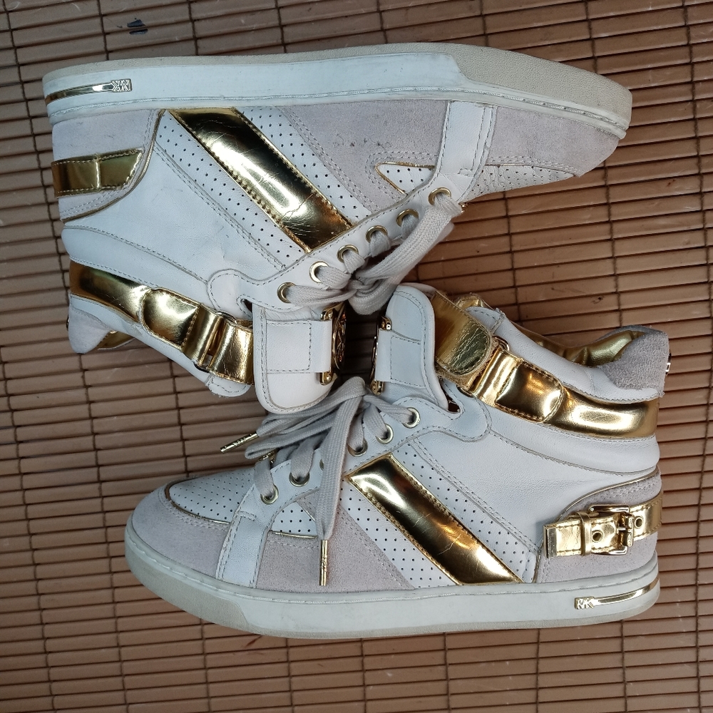 Michael Kors women's sz 9M high top sneaker boots. Perforated white leather and